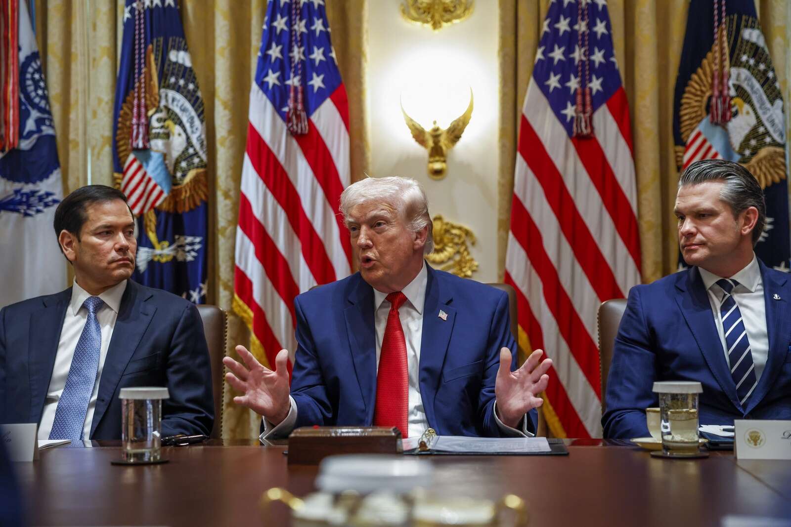 Latest: Stocks edge higher as Trump hails ‘progress’ on Iran deal