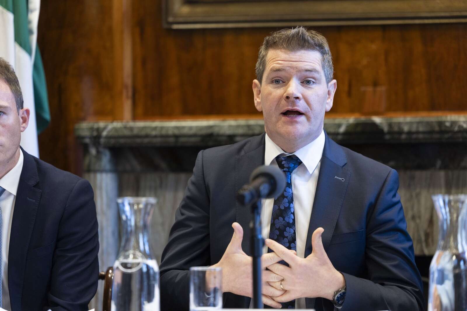 Government eases work permit pay hike after business pushback